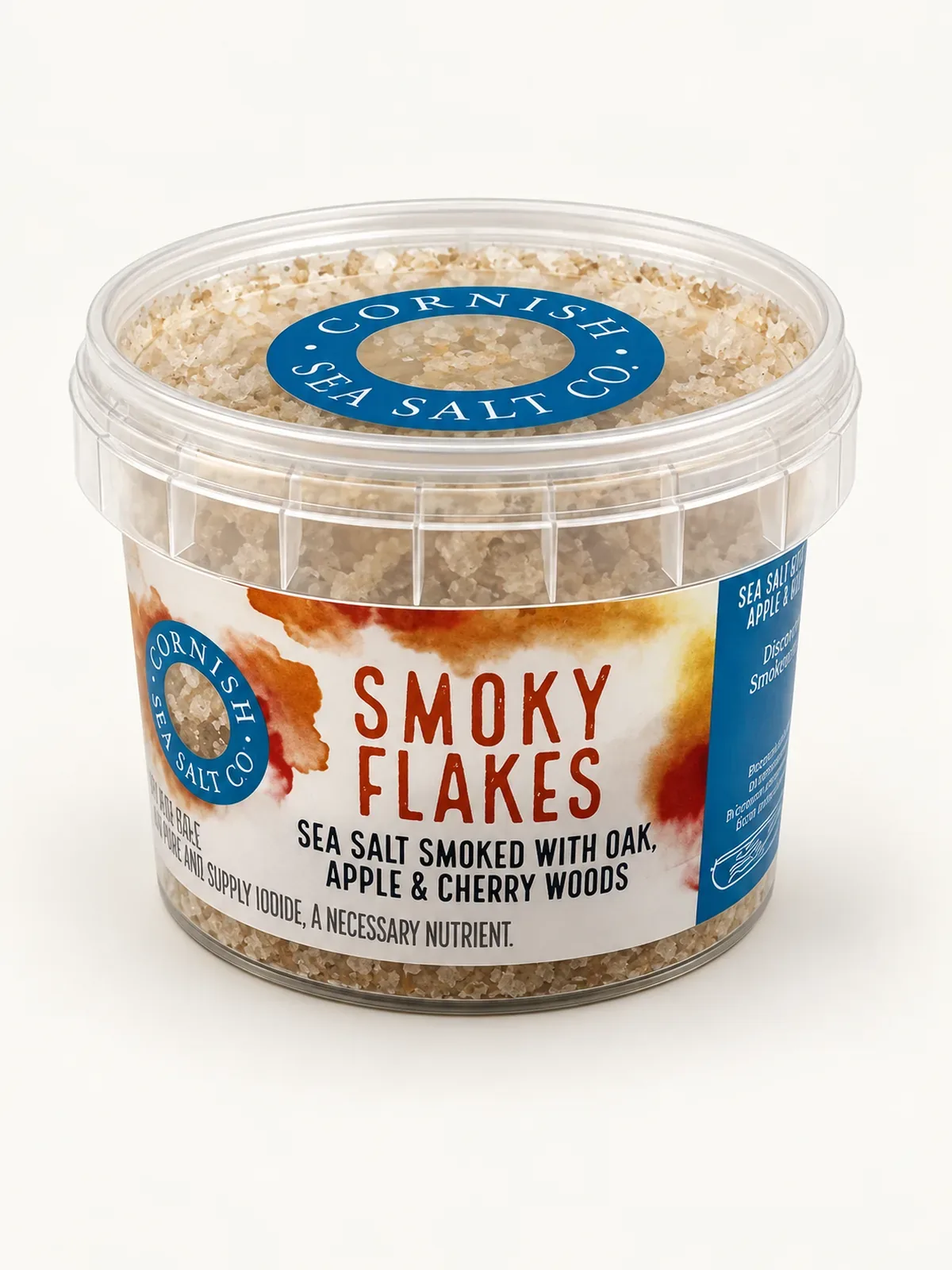 Clear plastic tub of Cornish Sea Salt Co. Smoky Flakes with an orange and white label