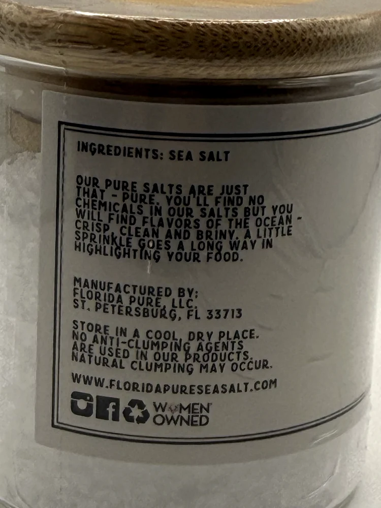 Ingredient, manufacturer and storage panel on the Florida Pure salt jar