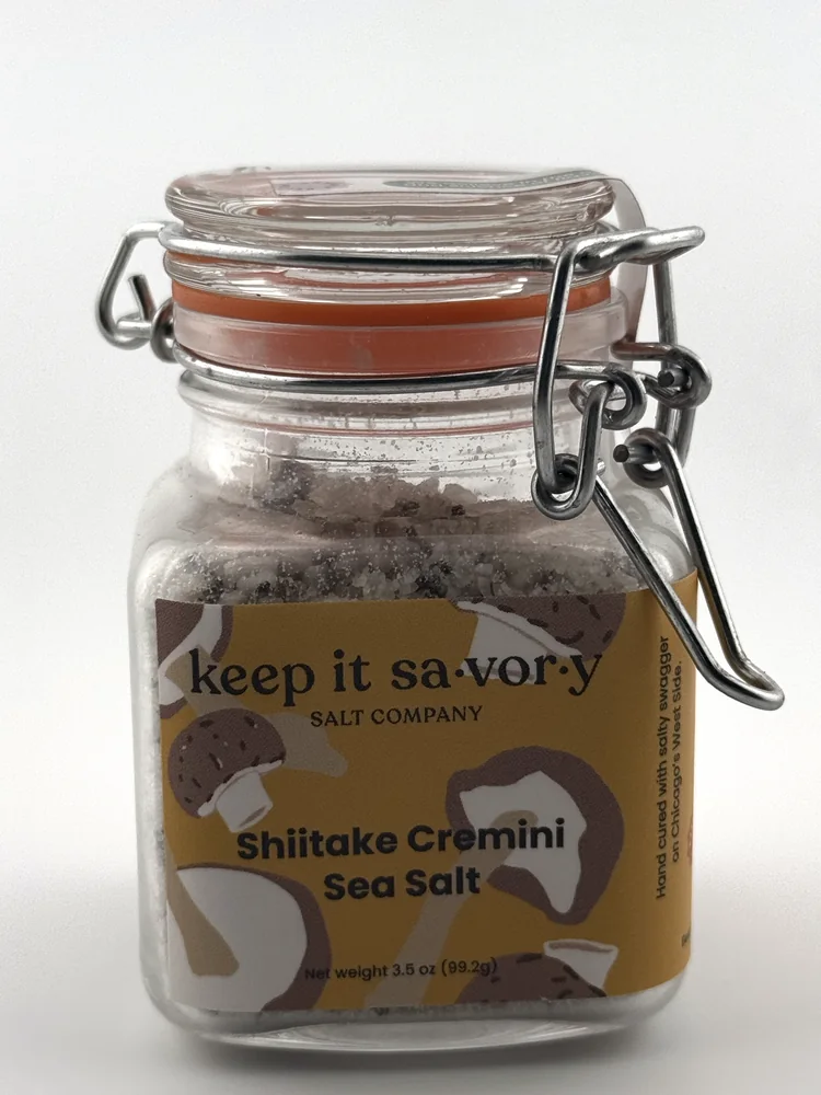 Glass clamp jar of Keep It Savory Shiitake Cremini Sea Salt with a mustard label