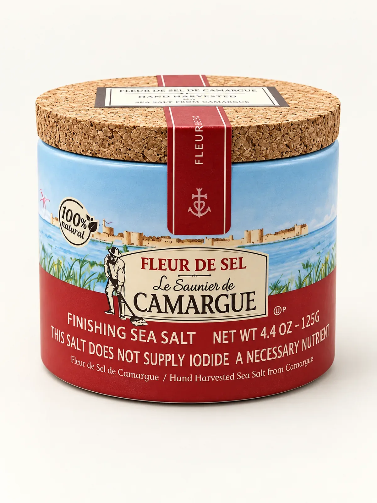 Cardboard drum of Le Saunier de Camargue fleur de sel with a cork lid and a painted scene of the Aigues-Mortes ramparts