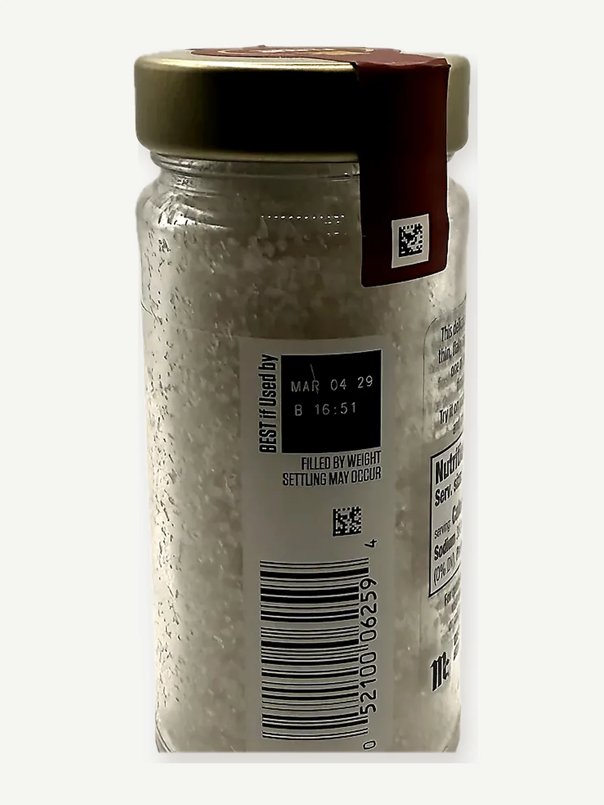Barcode and best-if-used-by code on the McCormick Gourmet Fleur de Sel jar