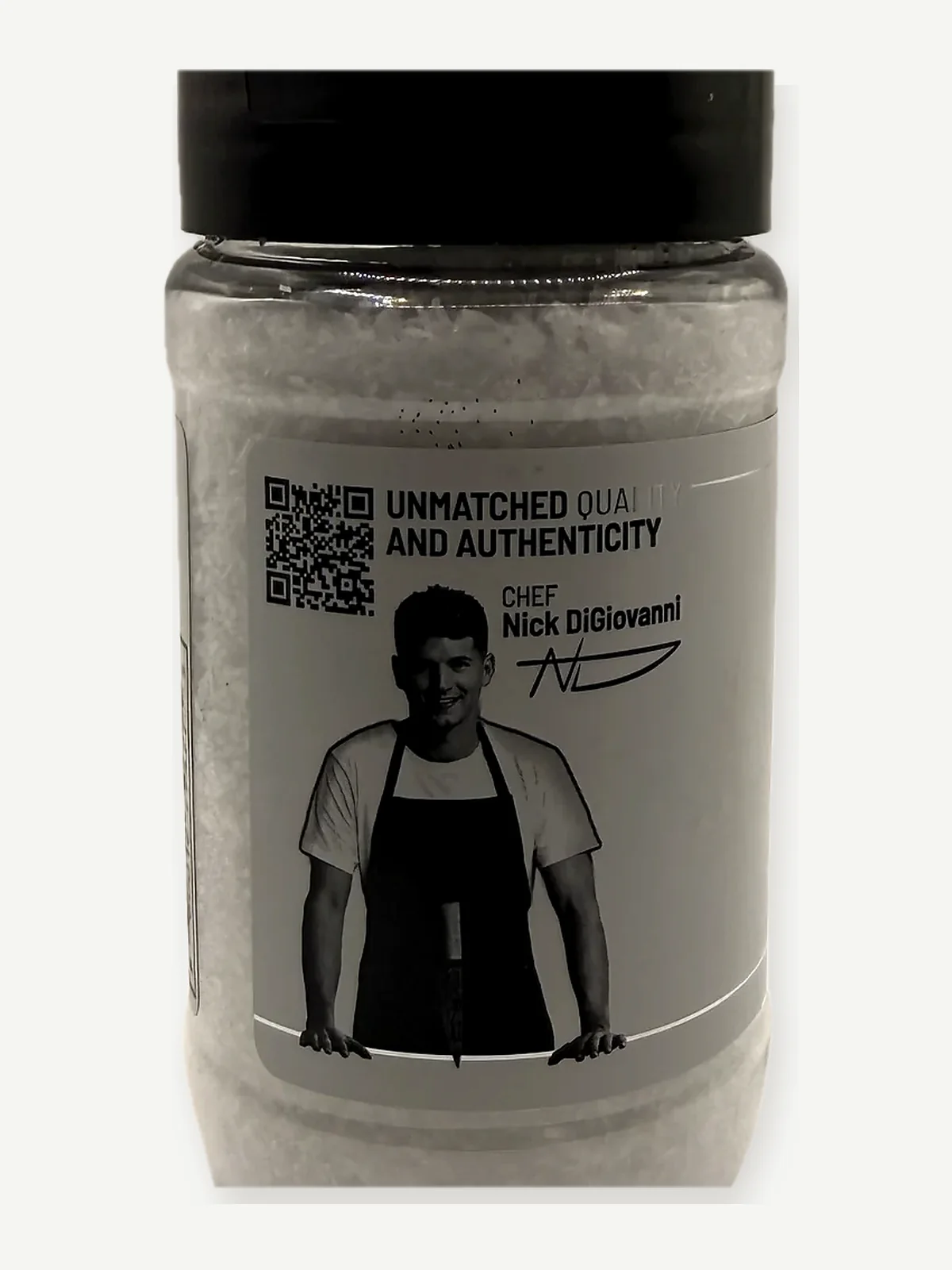 Back of the OSMO salt jar with a portrait and signature of chef Nick DiGiovanni