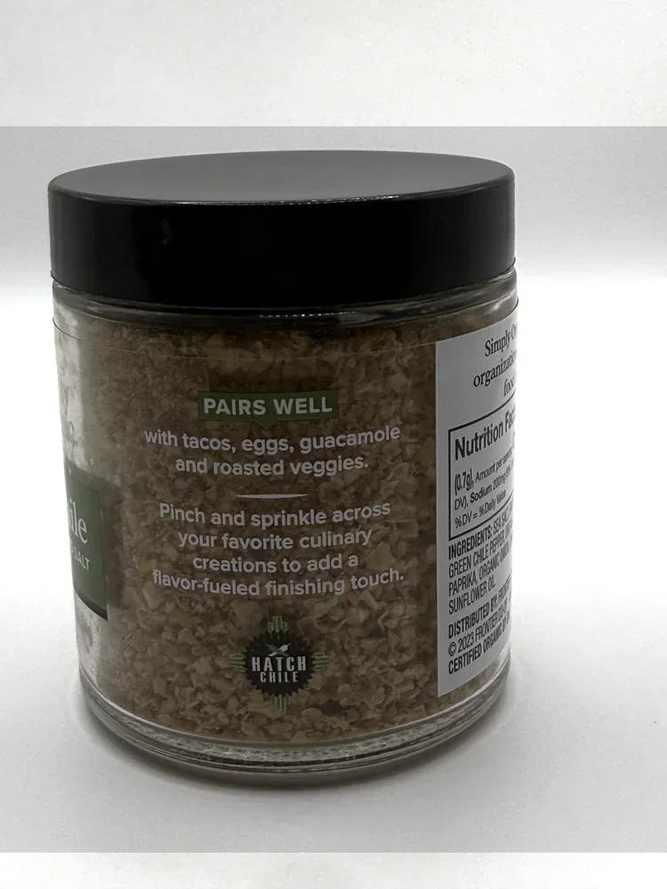 Side panel of the jar reading Pairs well with tacos, eggs, guacamole and roasted veggies