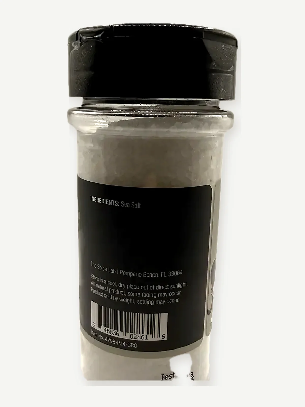 Ingredient, company address, storage directions, barcode and lot code on The Spice Lab salt jar