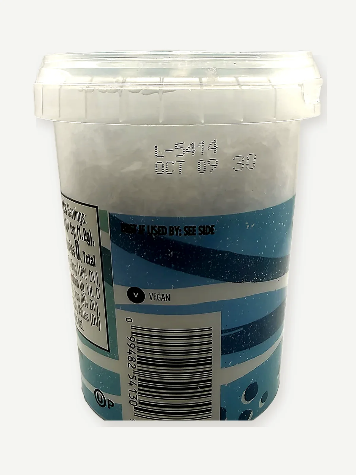 Lot, best-by date, vegan mark and barcode on Whole Foods Sea Salt Flakes
