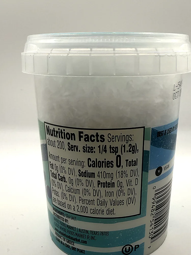 Nutrition Facts, ingredients, Greek origin, distributor and barcode on Whole Foods Sea Salt Flakes